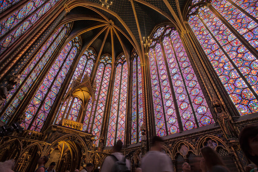 The interior of Sainte Chapelle, showing the stained glass windows and vaulted ceiling.